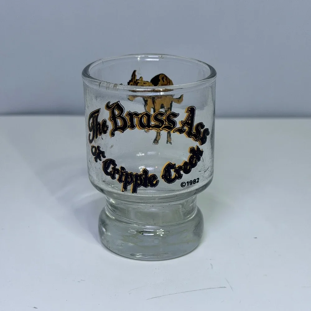Vintage 1982 The Brass Ass of Cripple Creek Colorado Souvenir Shot Glass